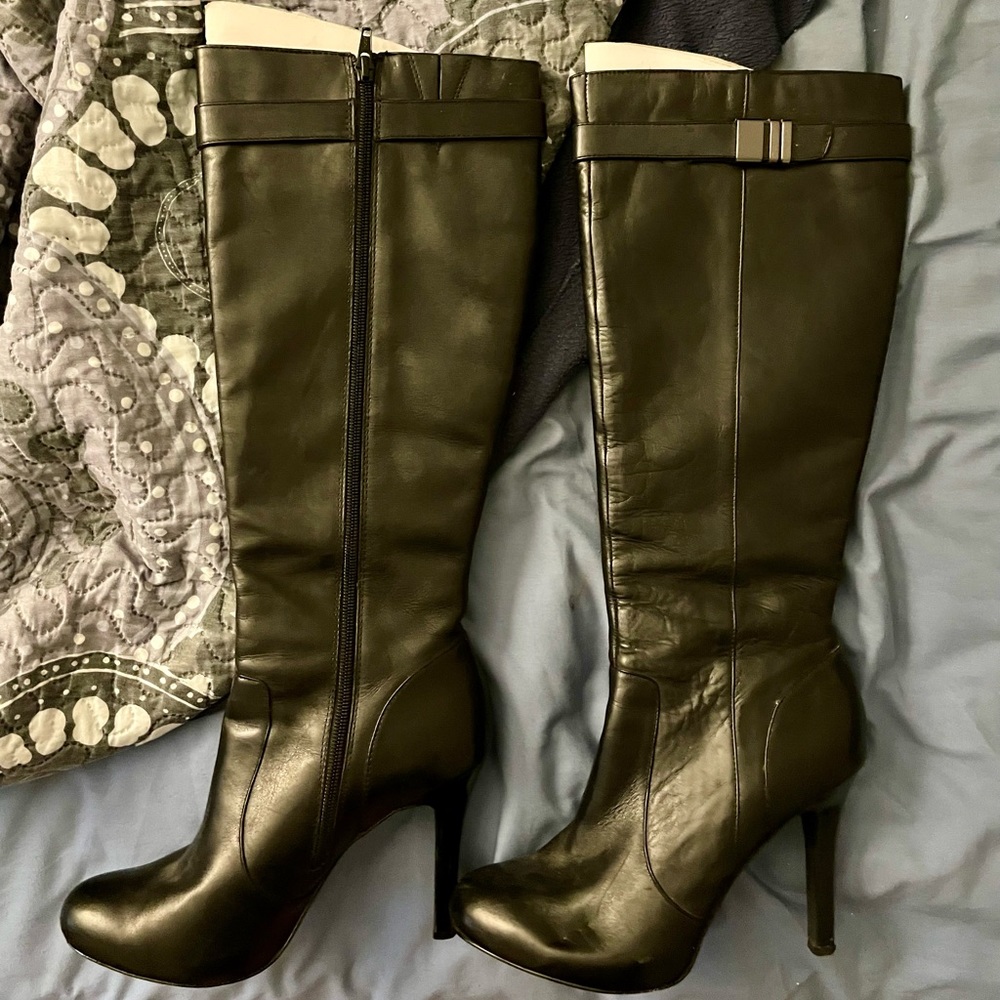 Black high heel (Concealed Platform) boots.